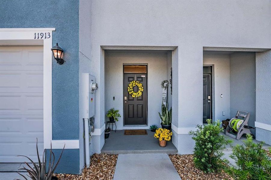 Exterior details and patio area of a home in Azalea Shores, Largo (Image 27).