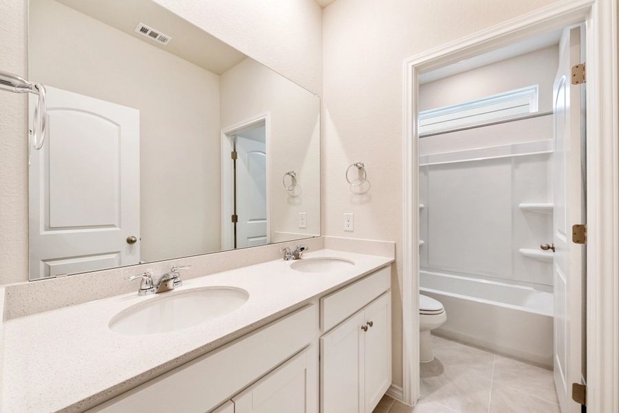 Furnished interior view inside a new home in The Cottages at Lariat, Liberty Hill (Image 31).