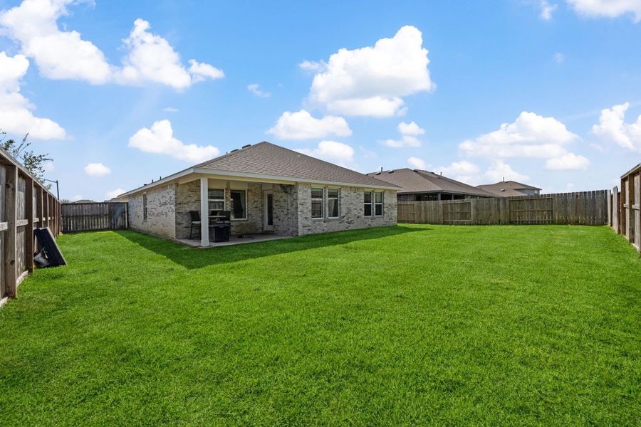 Exterior details and patio area of a home in River Ranch Meadows, Dayton (Image 22).
