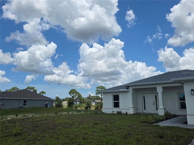 Exterior details and patio area of a home in , Cape Coral (Image 28).