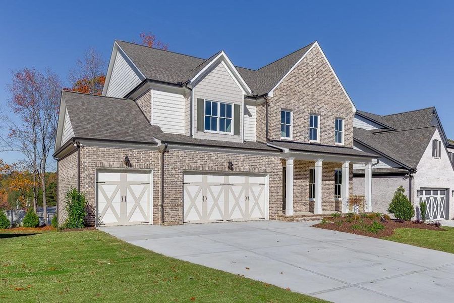 Front exterior of a new home in , Buford, GA, highlighting curb appeal (Image 31).
