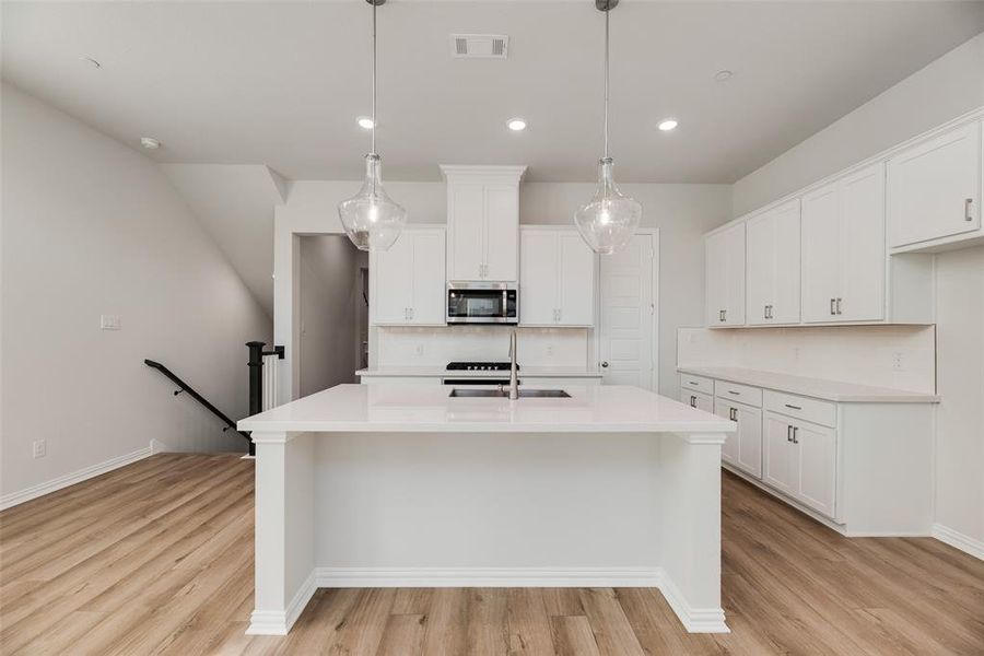 Furnished interior view inside a new home in Wade Settlement Townhomes, Frisco (Image 9).