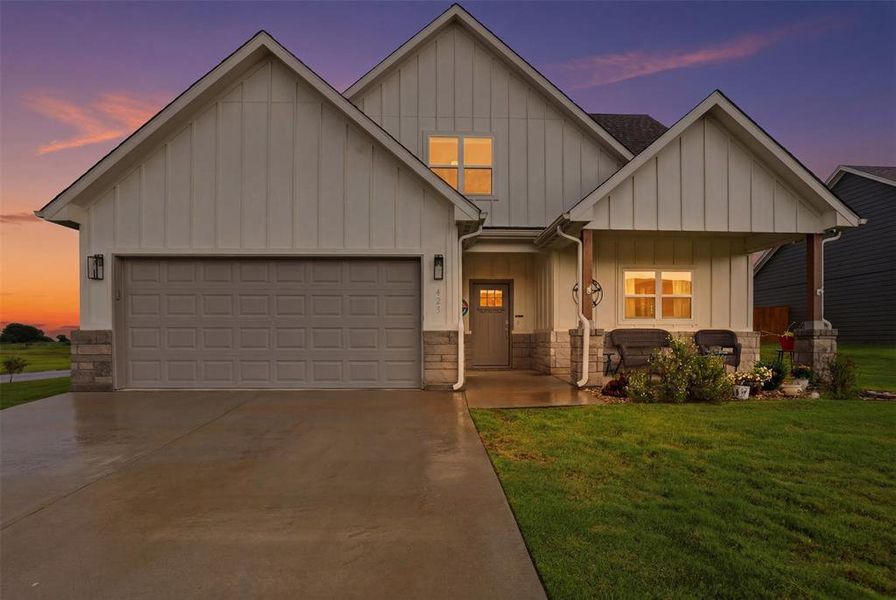 Front exterior of a new home in , Tolar, TX, highlighting curb appeal (Image 24).