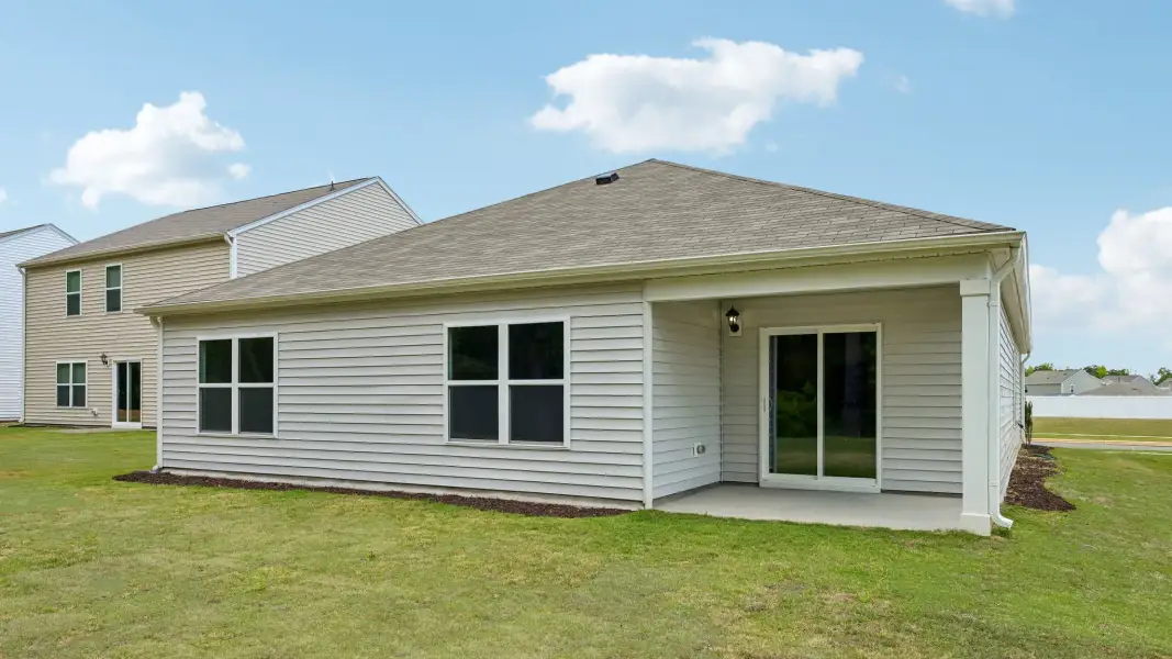 Exterior details and patio area of a home in Mangum Farms, Stem (Image 21).