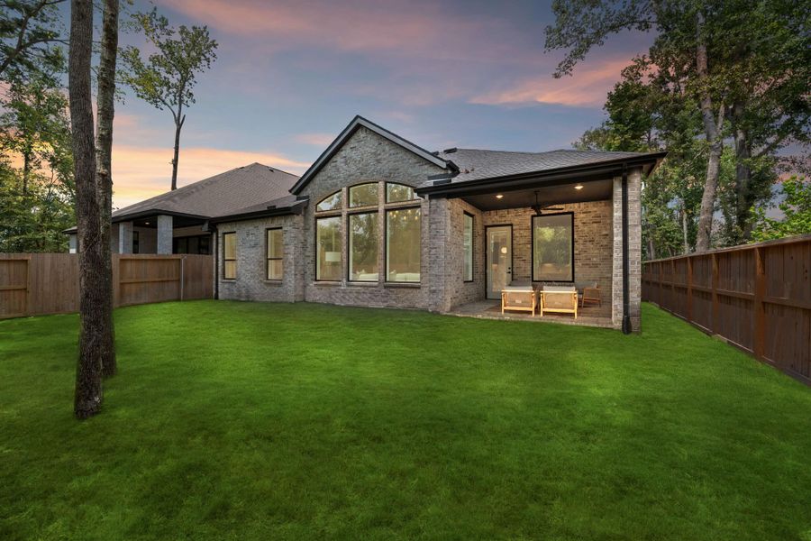 Exterior details and patio area of a home in The Highlands, Porter (Image 25).