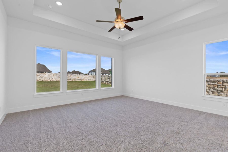 Primary Bedroom with tray ceiling Primary Bedroom with tray ceiling