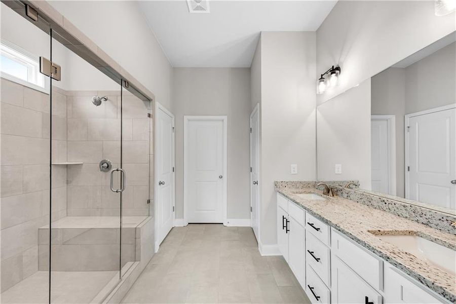 Furnished interior view inside a new home in Hidden Fields, Hoschton (Image 8).
