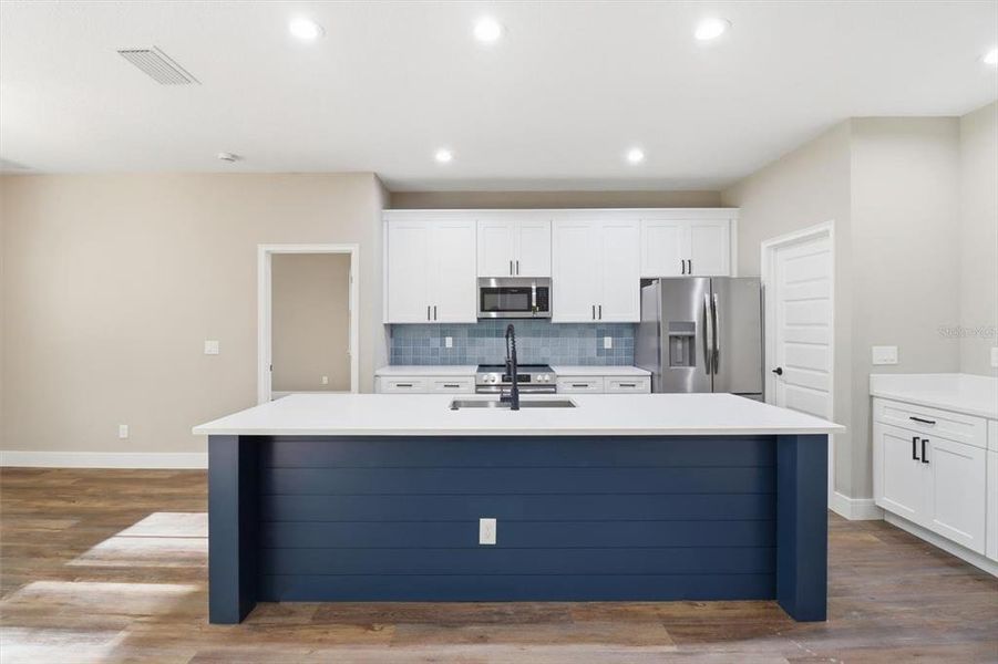 Furnished interior view inside a new home in , Dunnellon (Image 8).