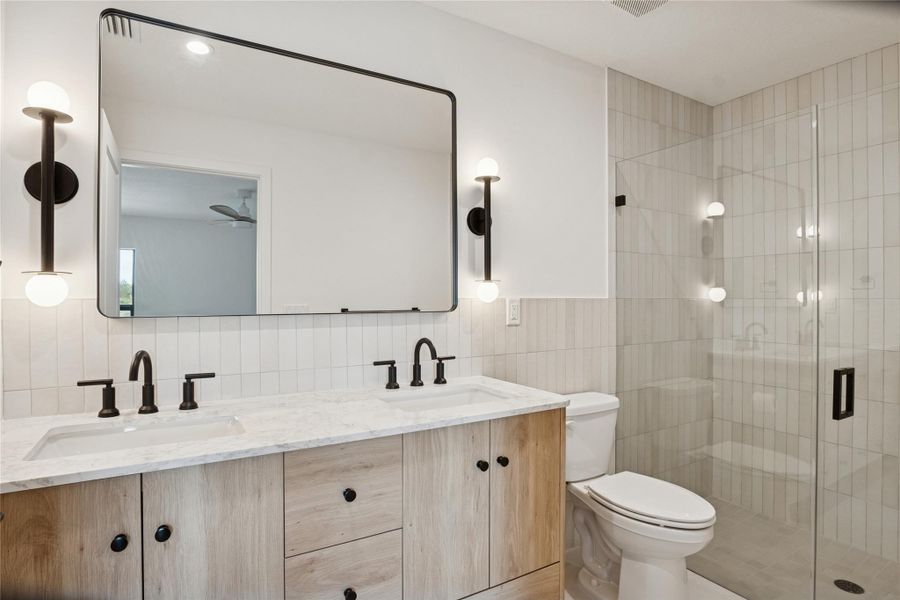 Master bath (lights on) Master bath (lights on)