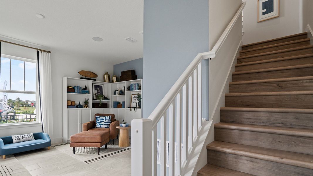Furnished interior view inside a new home in Parkview at Hamlin, Winter Garden (Image 12).