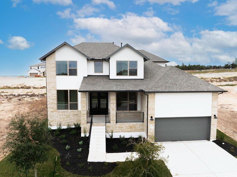 Front exterior of a new home in Provence - 60', Austin, TX, highlighting curb appeal (Image 1). Front exterior of a new home in Provence - 60', Austin, TX, highlighting curb appeal (Image 1).