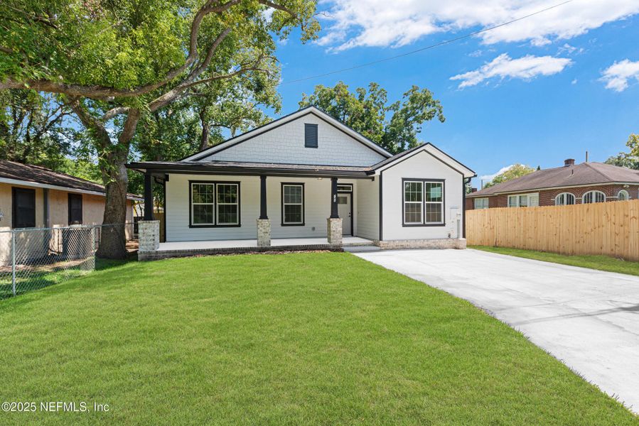 Front exterior of a new home in , Jacksonville, FL, highlighting curb appeal (Image 21).