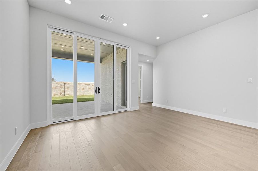 Spare room with recessed lighting and light wood-type flooring Spare room with recessed lighting and light wood-type flooring