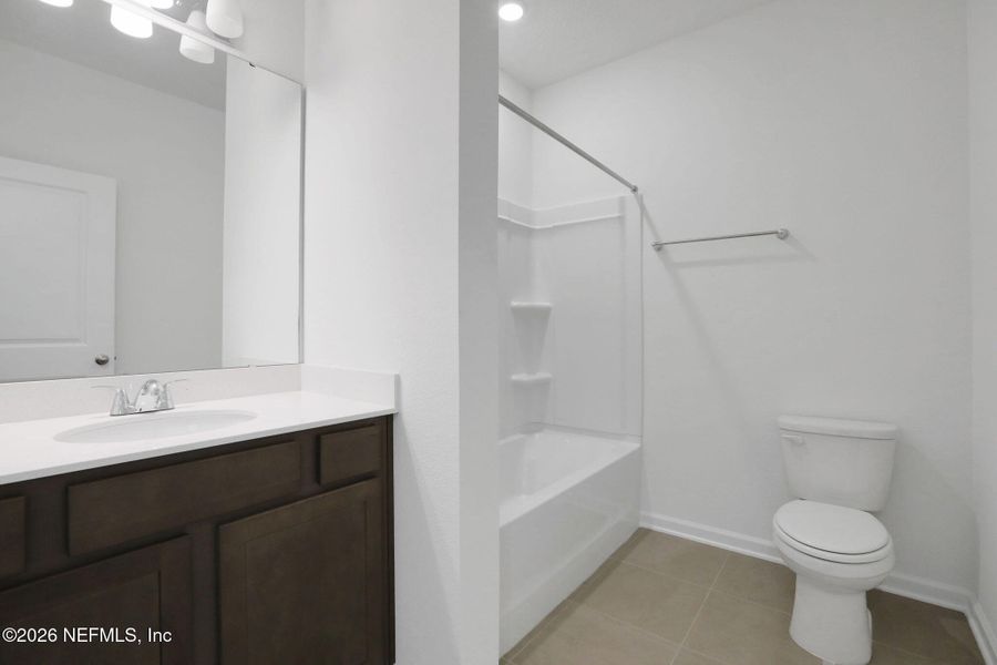 Furnished interior view inside a new home in Amberly, Green Cove Springs (Image 13).