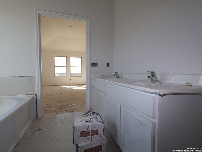 In-progress construction of a new home in Hunters Ranch, San Antonio, TX (Image 23).