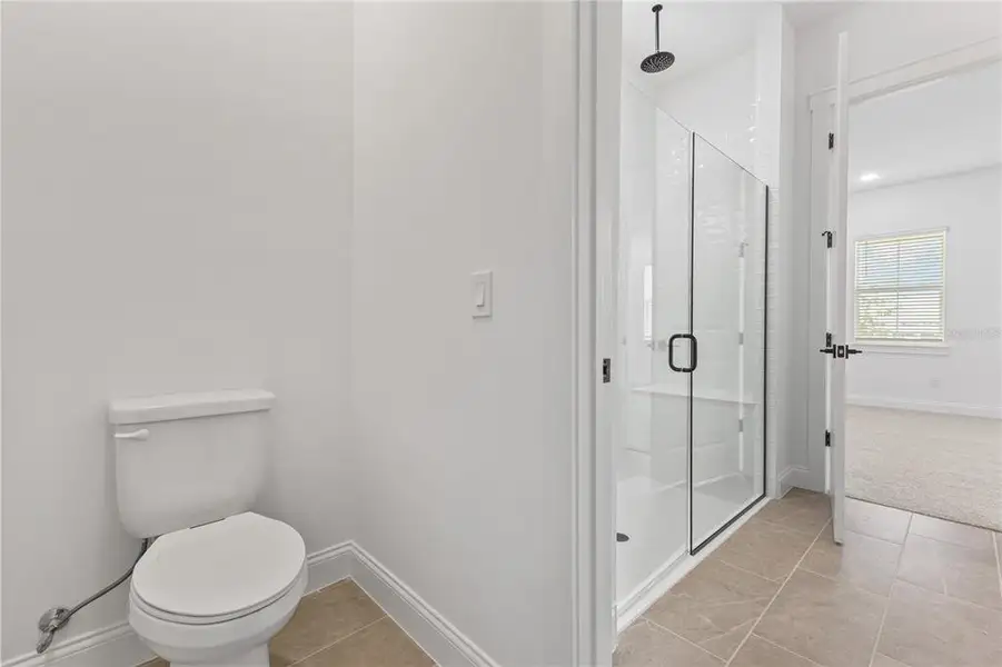 Furnished interior view inside a new home in Osprey Ranch, Winter Garden (Image 14).