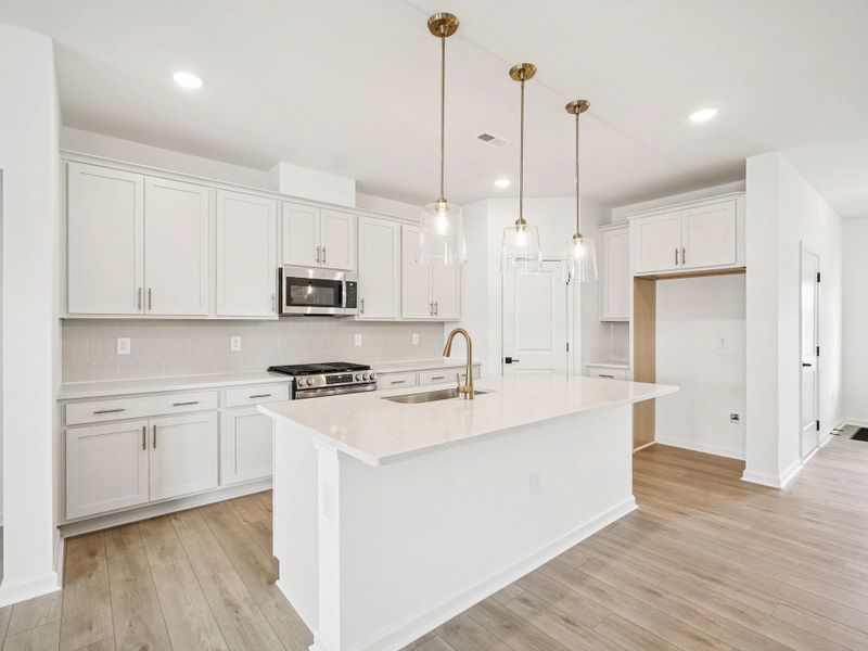 Kitchen featuring the AW Collection® Serene - Clean lines and earthy textures define the space.