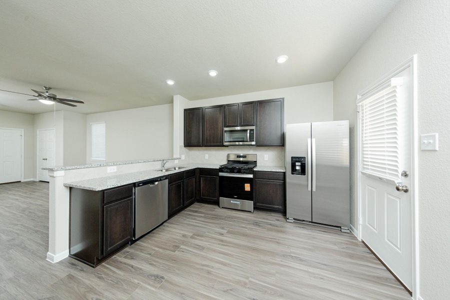 Furnished interior view inside a new home in Mackenzie Creek, Conroe (Image 8). Furnished interior view inside a new home in Mackenzie Creek, Conroe (Image 8).