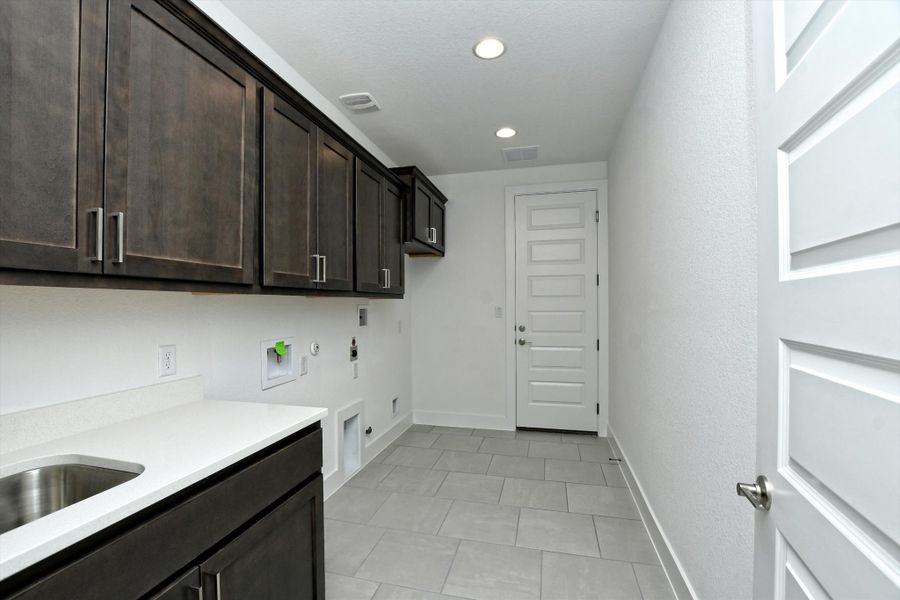 Representative furnished interior of a home built from the Madera II by Giddens Homes in Scofield Farms Estates, Georgetown (Image 278).