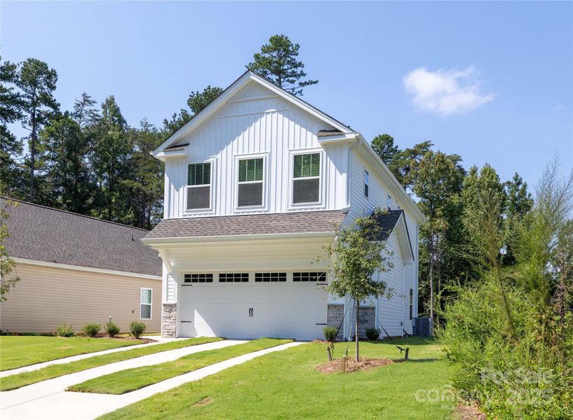 Front exterior of a new home in , Charlotte, NC, highlighting curb appeal (Image 21).