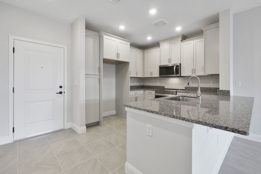 Furnished interior view inside a new home in Gatherings® of Lake Nona, Orlando (Image 6).