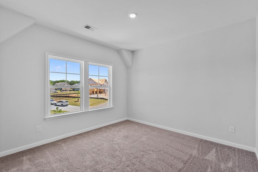 Spacious, unfurnished interior of a new home in Lilah Grove, Summerfield (Image 40).