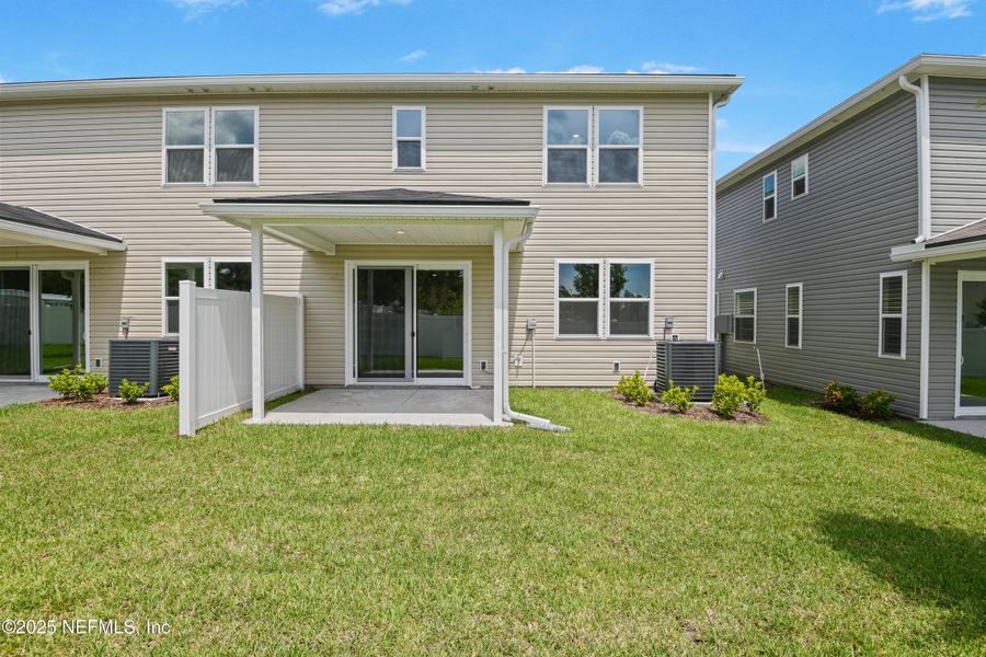 Front exterior of a new home in , Jacksonville, FL, highlighting curb appeal (Image 14).