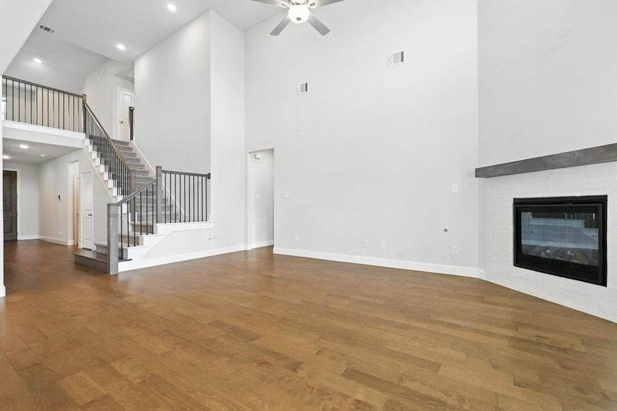 Massive living space with natural lights, remote shades/window coverings.
