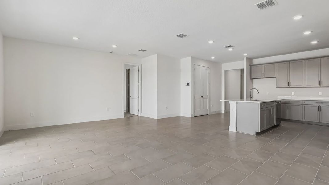 Furnished interior view inside a new home in Ardisia Park, New Smyrna Beach (Image 5).