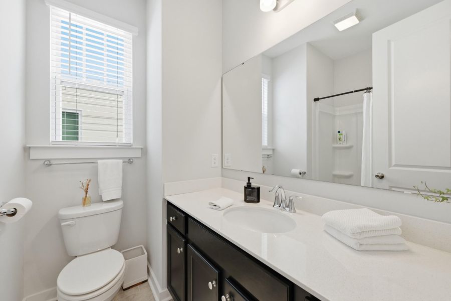 Furnished interior view inside a new home in Homecoming, Ravenel (Image 34). Furnished interior view inside a new home in Homecoming, Ravenel (Image 34).