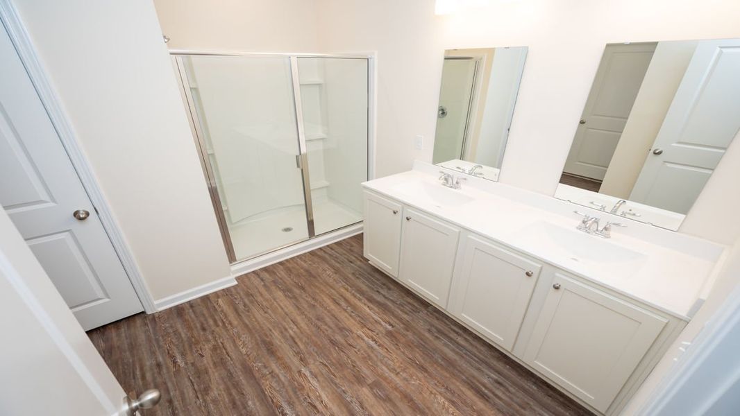 Representative unfurnished interior of a home built from the CALI by D.R. Horton in The Reserve at Wild Horse, Conway (Image 30).