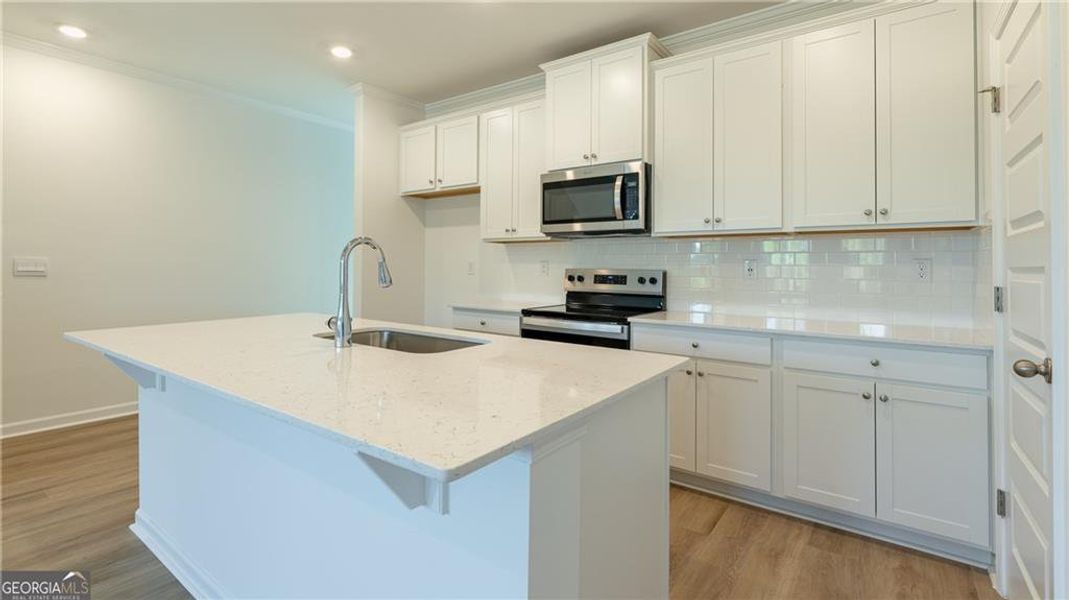 Furnished interior view inside a new home in Benteen Reserve, Atlanta (Image 9).