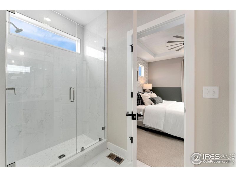 Primary Bath with upgrade Kohler fixtures and stall shower!