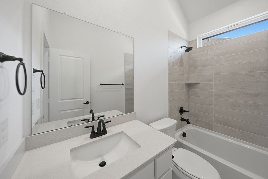 Furnished interior view inside a new home in Light Farms Brenham - 40' Lots, Celina (Image 13).