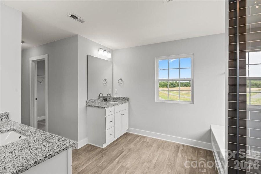 Furnished interior view inside a new home in , Monroe (Image 10).