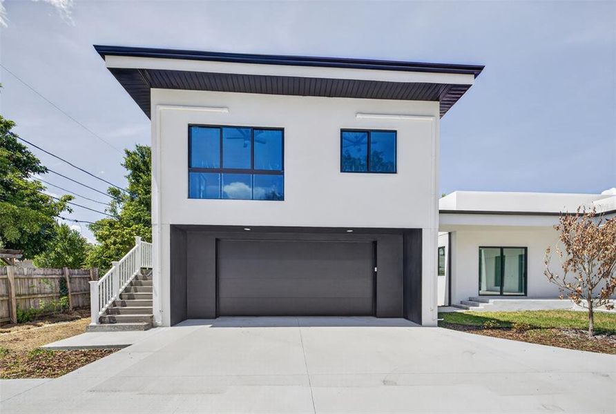 Front exterior of a new home in , St. Petersburg, FL, highlighting curb appeal (Image 28). Front exterior of a new home in , St. Petersburg, FL, highlighting curb appeal (Image 28).