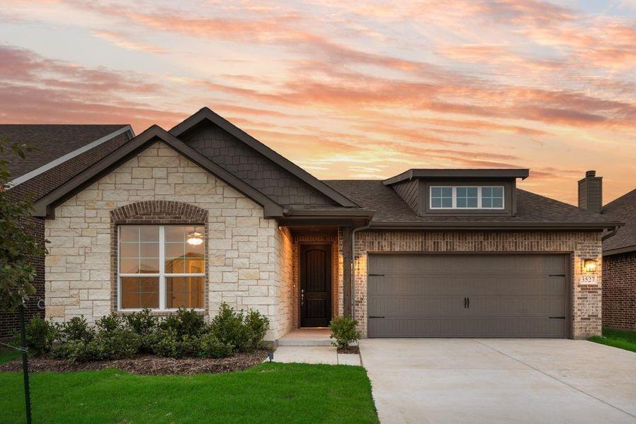 Front exterior of a new home in Liberty Pointe, Gainesville, TX, highlighting curb appeal (Image 16).