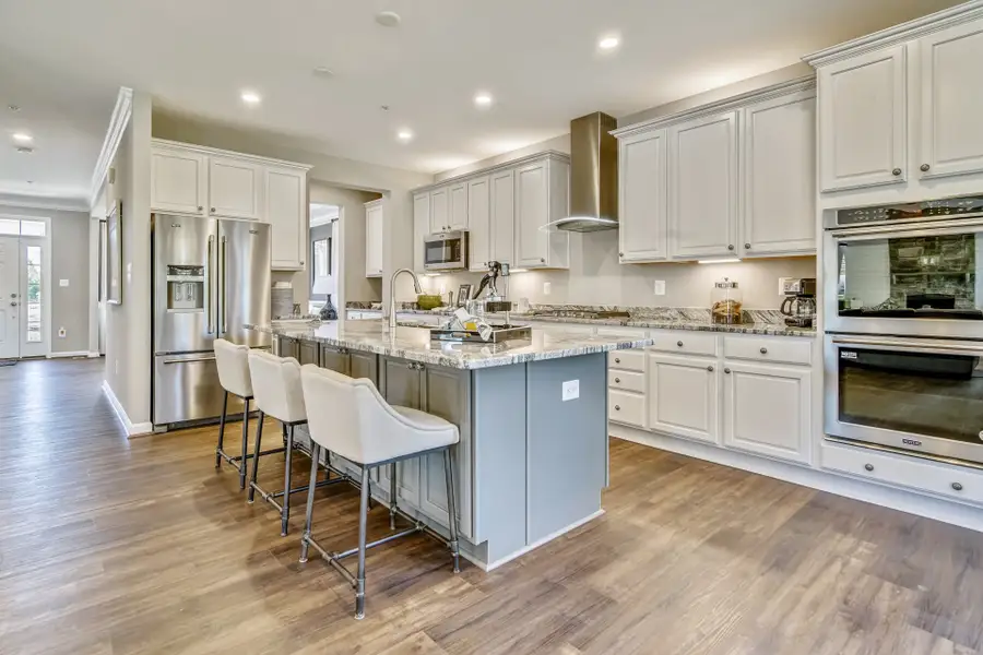 Representative furnished interior of a home built from the Wylie by Caruso Homes in Magnolia Acres, Fuquay Varina (Image 5).