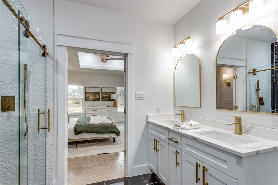 Bathroom with vanity and an enclosed shower