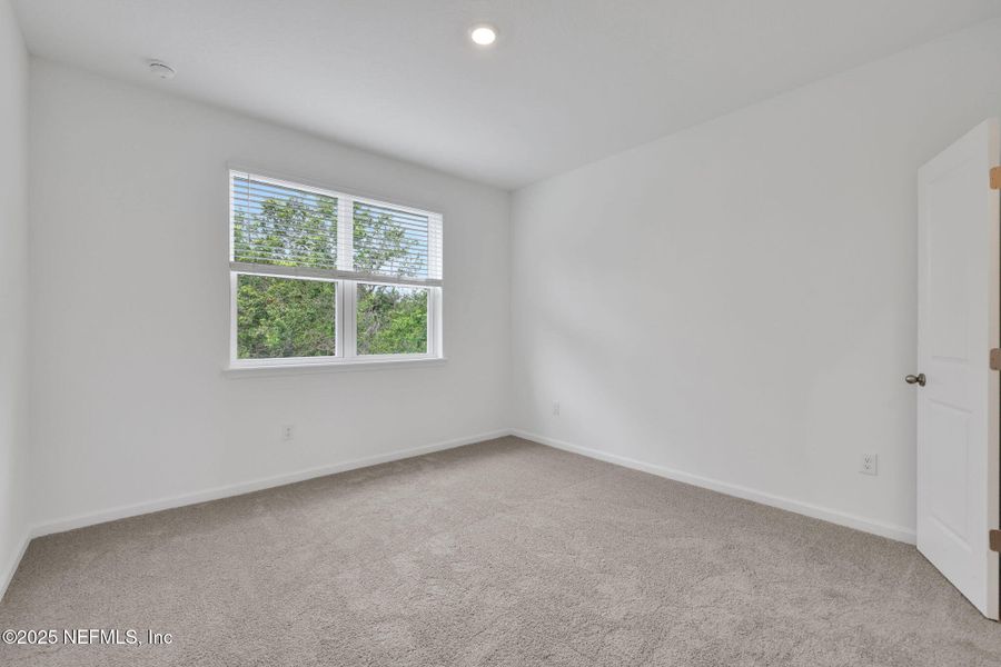 Spacious, unfurnished interior of a new home in The Hammock at Palm Harbor, Palm Coast (Image 13).