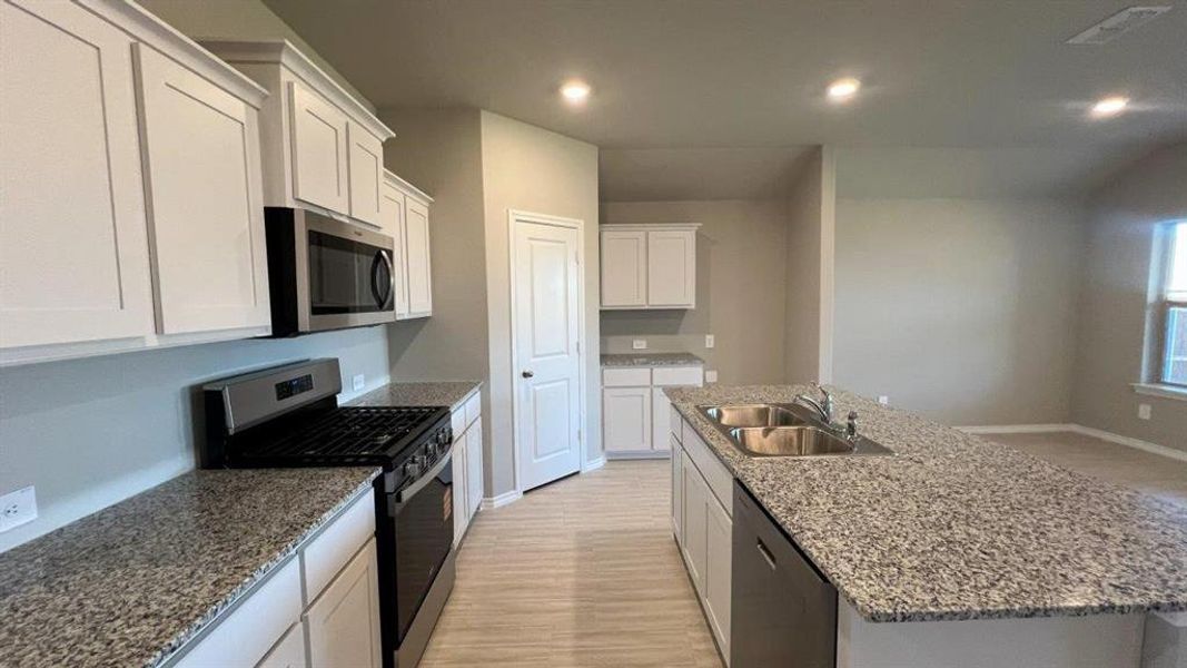 Furnished interior view inside a new home in Rosewood at Beltmill, Fort Worth (Image 7).