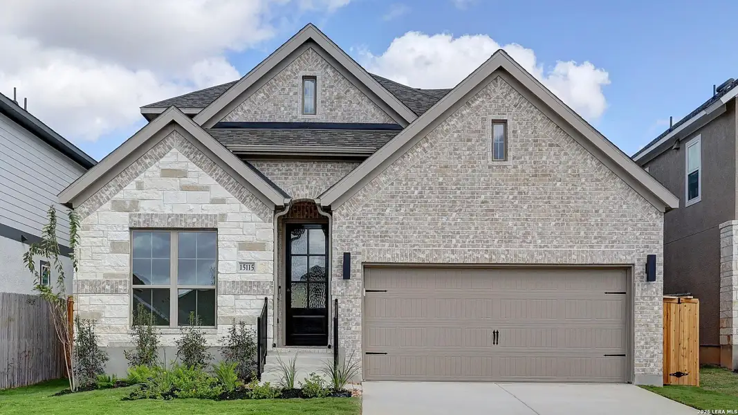Front exterior of a new home in Ladera, San Antonio, TX, highlighting curb appeal (Image 23).