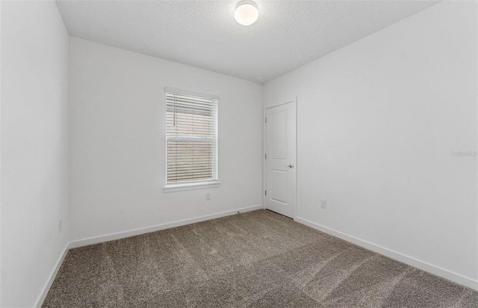 Spacious, unfurnished interior of a new home in Riverwood, Zephyrhills (Image 13).