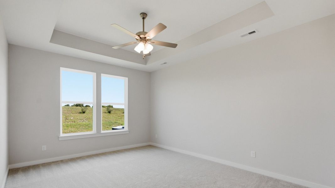 Primary bedroom on first floor with open design