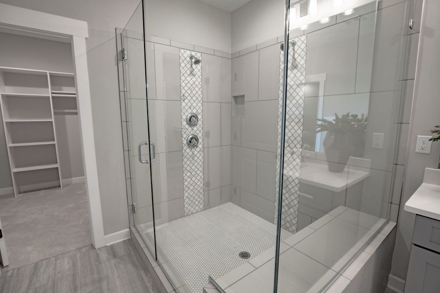 Representative furnished interior of a home built from the Willow by Grant & Co in Manor at Hall Creek, Arlington (Image 61).