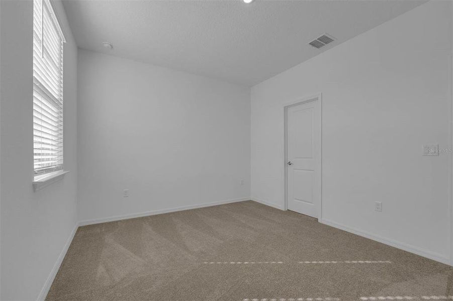 Spacious, unfurnished interior of a new home in Brack Ranch, St. Cloud (Image 30).
