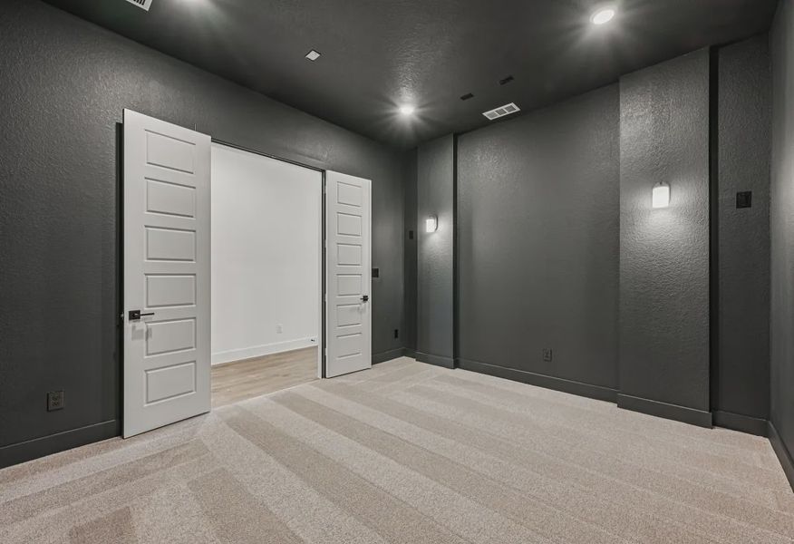 Plan 5072 Downstairs Media Room - 11 of 26