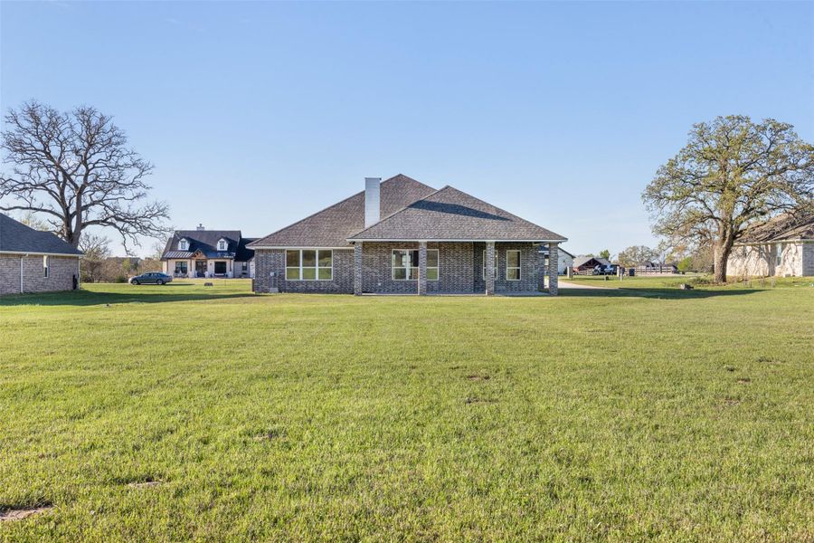 Exterior details and patio area of a home in , Iola (Image 4).