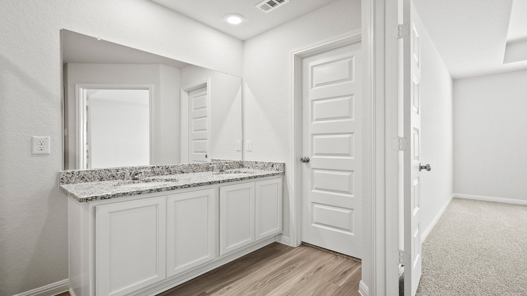 Furnished interior view inside a new home in Hunters Ranch, San Antonio (Image 10).