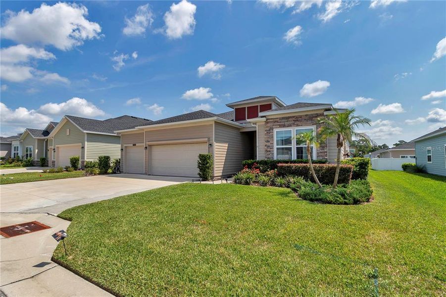 Front exterior of a new home in , Ocala, FL, highlighting curb appeal (Image 1). Front exterior of a new home in , Ocala, FL, highlighting curb appeal (Image 1).